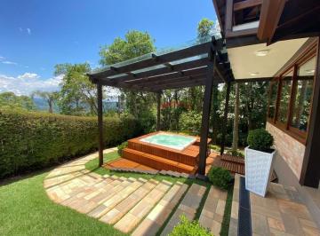 Casa · 372m² · 4 Quartos · 8 Vagas · Casa em condomínio fechado com 2.014m² de terreno, vista panorâmica, e arquitetura excusiva.