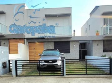 Foto 01 · Alugo por temporada em Garopaba, sobrado novo com 3 dormitórios(2 suítes), split e wi-fi, banheiro s