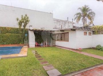 Área de Serviço · Casa com 4 quartos à venda em Chácara Das Pedras - RS