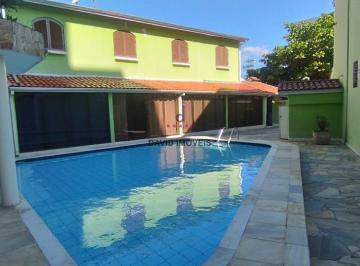 oi2sec42ntmxyjmzmty3y2zh_md · Sobrado em Condomínio com Piscina em Caraguatatuba, Próximo à Praia