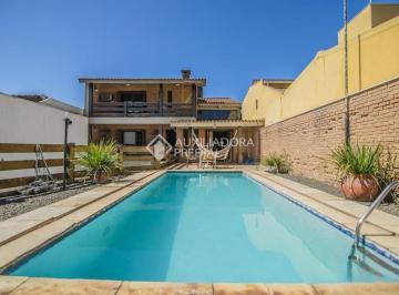 137185_iN0cu5_137185653cee7b852cf.jpg · Casa á Venda - Três Figueiras, Porto Alegre - RS.