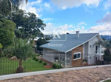 Casa · 184m² · 3 Quartos · 4 Vagas · 
                Kessler Vende charmosa casa de 3 dormitórios no bairro Santa Helena.
              