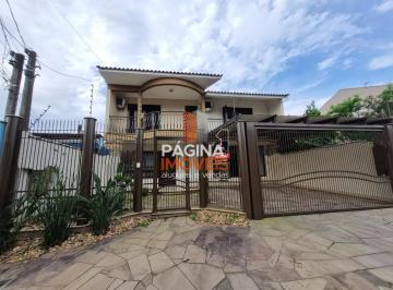 Casa · 318m² · 4 Quartos · 2 Vagas · Página 1 Imóveis anuncia lindo sobrado com piscina para venda na Estância Velha em Canoas/RS.