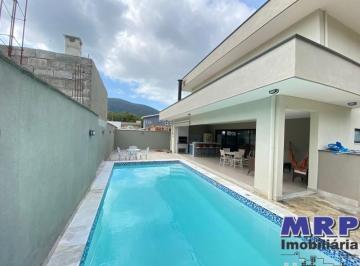 Foto 07 · Casa à venda em Ubatuba. Praia da Lagoinha. Condomínio fechado. 4 dormitórios. Com piscina.