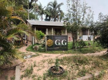 aa488064d794fd7292677c90733864e03cd18a54 · Chácara com 3 dormitórios à venda, 3000 m² por R$ 300.000,00 - Águas Claras - Viamão/RS