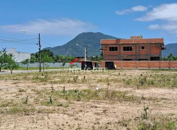 Terreno · 300m² · Lote em condomínio em  Alameda Quaresmeiras Roxas  - Condomínio Flora Rica - Peruíbe/SP
