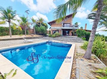 cd6d13968ef652e4e7f9c22cdf7e93c99ad978ab · Casa no Porto das Dunas com vista mar 4 quartos alto padrão.