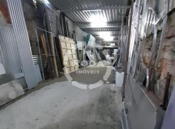 Foto 01 · Terreno comercial em rua movimentada, com diversos tipos de comercio.