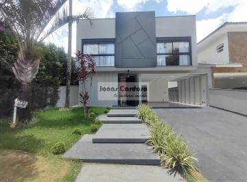 Foto 01 · Sobrado no condomínio Arujá 5, com 300m² de construção, todo mobiliado, com piscina e 4 suítes, send