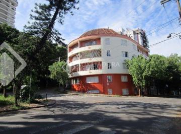 fachada · amplo apartamento de três quartos frente na Rua General Neto, desocupado.