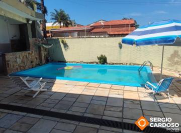 Casa · 143m² · 3 Quartos · 2 Vagas · CASA MOBILIADA COM 3 QUARTOS, SUÍTE, PISCINA E CHURRASQUEIRA A 200M DO MAR!