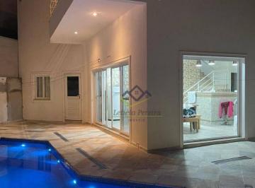 e3eb8c2e81fd349844376ef7b977c8533171bd8f · Sobrado com 3 dormitórios à venda, 300 m² por R$ 2.850.000,00 - Aruã Ecopark Lagos - Mogi das Cruzes