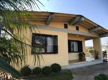 Foto 01 · Casa com 4 dormitórios na Cidade Alta