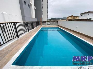 Foto 01 · Apartamento novo á venda no Centro de Ubatuba. 3 dormitórios. Com varanda gourmet e piscina.