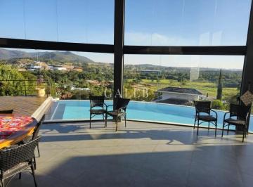 Foto 05 · Casa de luxo em condomínio: 3 quartos, 3 suítes, 4 salas, 6 banheiros, 12 vagas de garagem e 564m² e