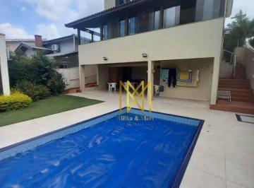 ea7cf210581fa2f23d751e41576c37073f05f054 · Casa com 4 dormitórios, 320 m² - venda por R$ 2.600.000 ou aluguel por R$ 14.000/mês - Alphaville -