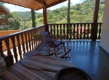 202405291914097962.jpg · Casa em Santo Antônio do Pinhal: Espaço e Conforto!