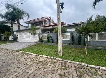 Casa · 230m² · 3 Quartos · 2 Vagas · Casa de esquina no bairro Santa Catarina