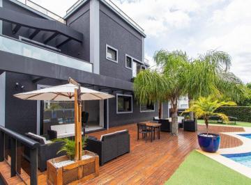 1 · Casa Residencial de 5 dormitórios em Jurerê Internacional