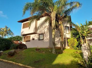 lrhkxmm2nzewzmvjzmnjyju1_md · Casa ampla em condomínio na Cachoeira com quartos térreos e perto do mar