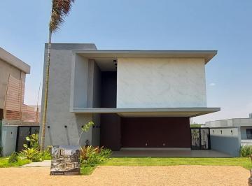 7910ebdded2848ec83a075bf558f1387.jpeg · Casa para Venda em Uberlândia/MG - 3 Dorm. 233 m2 Área Útil