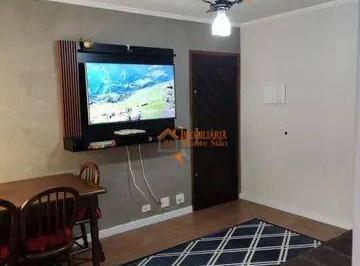 bb46248f968116dbc2f534e12c0ef8219bb9f18c · Apartamento com 2 dormitórios à venda, 61 m² por R$ 270.000,00 - Centro - Guarul