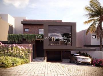 Photo 1 · Casa em condomínio com 3 suítes, sala dois ambientes, 5 banheiros e 2 vagas na g