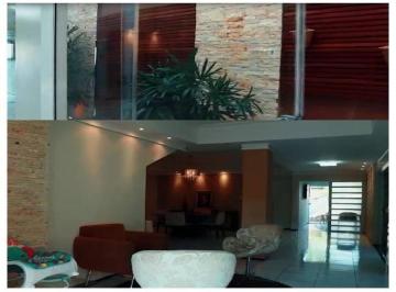 e2ef4093234e8baf7cb3bdc450b56e2b.jpg · Casa duplex, excelente padrão, salas, suítes, piscina