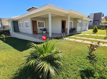Foto 01 · Casa com 5 quartos (2 suítes), área gourmet, spa, com 326 m² de área construída, à venda no Condomín