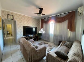 Sala · Apartamento à venda no Jardim Paraíso em São Vicente.