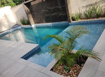 8c48bdb2c3045319b81c714624df5317db62201d · Casa com 4 quartos e piscina no bairro Ingleses, em Florianópolis/SC.