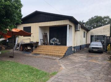 519792_in8p16463i_5197926621733de7fa2.jpg · Casa com um grande terreno em Dois Irmãos!