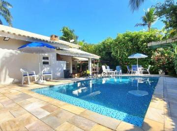 76167ba2b27321cb9d8da59d4485b9703626a178 · Aconchegante casa em estilo rústico minimalista dentro de condomínio fechado na região da praia de P