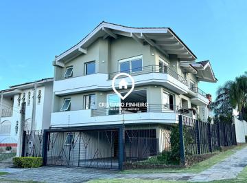 Casa · 573m² · 3 Quartos · 4 Vagas · Sobrado com 3 dormitórios sendo 3 suíte com closet à venda no bairro Dom Feliciano em Gravataí/RS