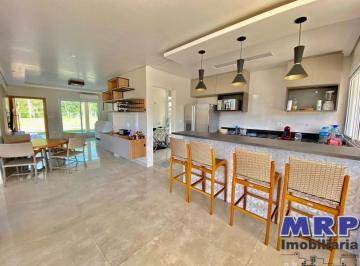 Foto 01 · Casa em condomínio em Ubatuba. Praia da Lagoinha. 4 dormitórios. Alto padrão. Com piscina.