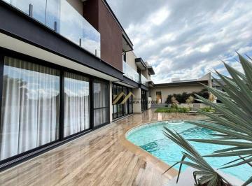 Area da piscina · CASA ALTO PADRÃO À VENDA - 3 SUÍTES - 290 M² A.C, 700 M² A.T. - R$ 4.250.000,00 - CONDOMÍNIO BRISAS