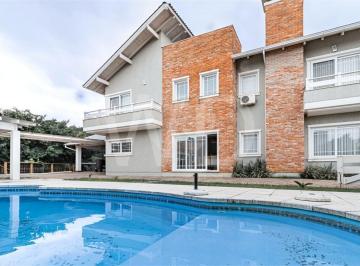 Casa · 330m² · 3 Quartos · 4 Vagas · Condomínio com 3 quartos à venda em Hípica - RS