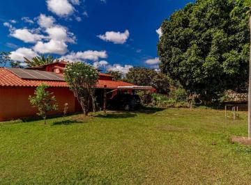 Casa · 346m² · 6 Quartos · 5 Vagas · Casa com área de lazer e área verde exuberante em condomínio fechado!