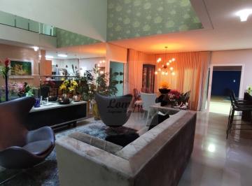 Foto 01 · Casa de luxo em condomínio fechado no Jardim Itália - Cuiabá-MT  4 suítes, 382m², 4 vagas  Próximo a