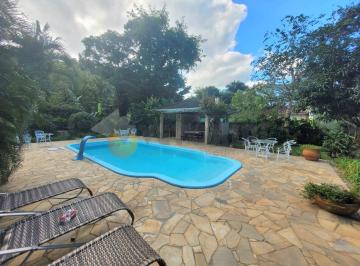 fe31a626e2dd6eeccec68fe6685da44683233820 · Casa com 5 dormitórios à venda, 217 m² por R$ 1.500.000,00 - Massaguaçu - Caraguatatuba/SP