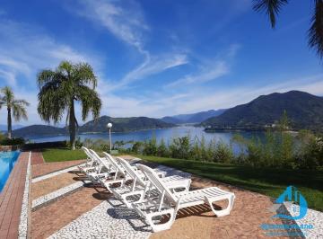 Imagem do Imóvel · Lindo apartamento com 3 dormitórios vista para o mar, quadra de tênis, Piscinas, Condomínio Fechado