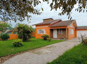 472877_i9Vo3Ca1kA_472877655b6301f2292.jpg · Casa 4 dormitórios, 03 banheiros, garagem fechada com extenso jardim.