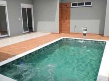 b6b1bb415957811ba66e2cbbc738138f19a16f40 · Casa com 3 dormitórios à venda, 200 m² por R$ 1.600.000,00 - Loteamento Green View Village - Indaiat