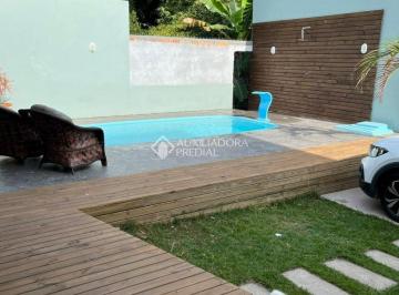 481082_iCZ5Ab8vO79455291649_4810826667477bf277e.jpg · Casa 4 Dormitórios, sendo 1 suíte no Rio Tavares