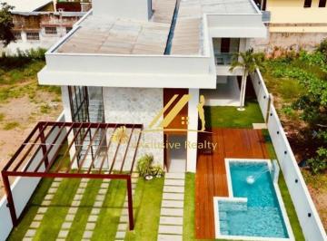 Foto 01 · Casa de luxo em Guarajuba, a 200m da praia, no Condomínio Paraíso! 8 suítes, super moderna. Piscina