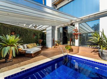 Casa · 340m² · 3 Quartos · 4 Vagas · Casa estilosa com piscina aquecida e jardim zen