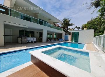 Foto 02 · Casa à venda no M18 na Riviera, em rua larga, com 6 suítes, 520 m² de área construída.