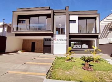 Foto 01 · Imperdível casa à venda no Jardim das Cerejeiras em Arujá. Com 4 quartos, 4 suítes, 3 salas, 5 banhe