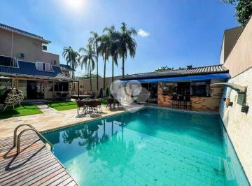 e935e139d9fd56e9d838a0fa6b5f7f309afcd467 · Condomínio Lagoa Mar Norte - Casa Triplex reformada a venda no início da Barra da Tijuca. Próximo ao