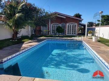 Foto 15 · casa peruíbe, balneário oasis, 3 suítes, 2 salas, cozinha , 7 vagas, edícula com 1 quarto. sala. coz